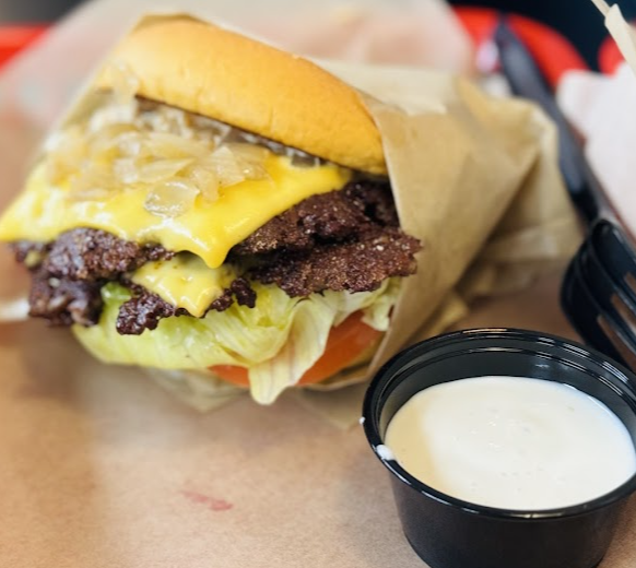 Route 66 Restaurant signature dishes Double CheeseburgerFried Chicken SandwichThe Deluxe Cheesesteak